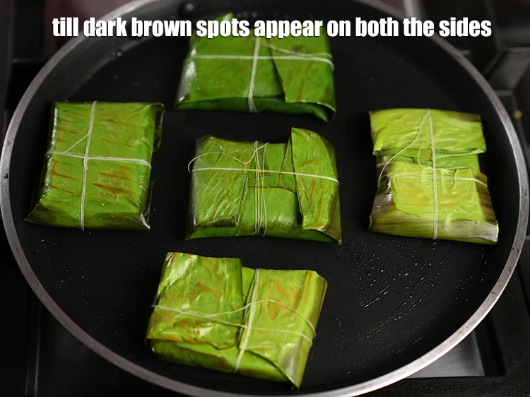 Step 23 – <p>Cook till dark brown spots appear on both the sides.</p>