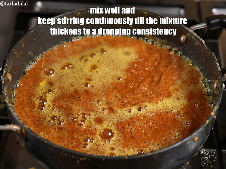 Step 25 – <p>Mix well and keep stirring continuously till the mixture thickens to a dropping consistency.</p>