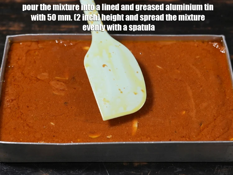 Step 27 – <p>Pour the mixture into a lined and greased aluminium tin with 50 mm. (2 inch) …