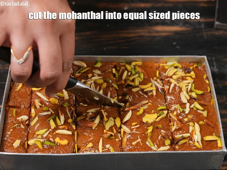 Step 31 – <p>Cut the mohanthal into equal sized pieces.</p>
