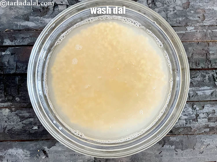 Step 5 – <html><head><meta charset="UTF-8"></head><body><p>Put the yellow moong dal in water and wash it. You can see the …