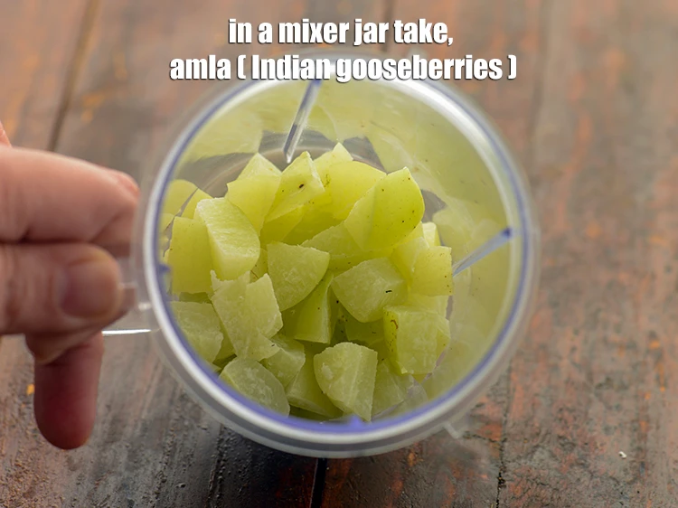 Step 1 – <p>To prepare <strong>amla chutney,&nbsp;</strong>&nbsp;in a mixer jar take ½ cup 1/2 cup deseeded and roughly …