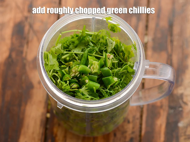 Step 3 – <p>Add 1 tbsp roughly <a href="https://www.tarladalal.com/glossary-green-chillies-hari-mirch-331i#ing_2388"><u>chopped green chillies</u></a>. This being a spicy green chutney we …