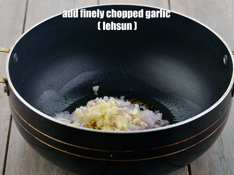 Step 17 – <p>Add the 2 tsp finely <a href="https://www.tarladalal.com/glossary-garlic-lehsun-lahsun-348i#ing_2370"><u>chopped garlic (lehsun)</u></a>. This gives a great taste and …