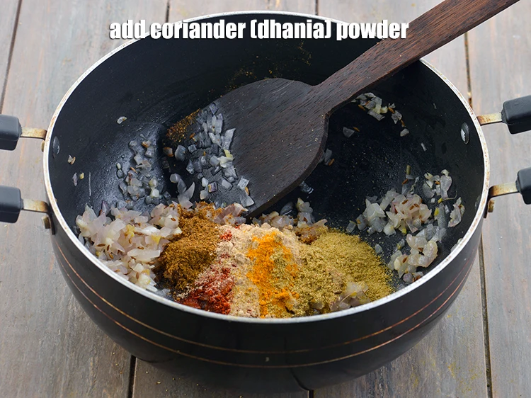 Step 23 – <p>Furthermore, add the 2 tsp <a href="https://www.tarladalal.com/glossary-coriander-powder-dhania-powder-370i"><u>coriander (dhania) powder</u></a><u>.</u></p>
