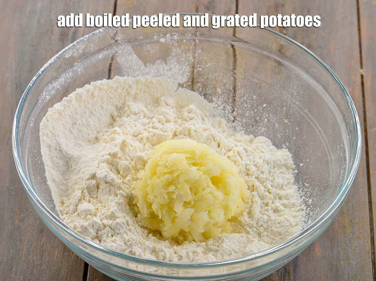 Step 32 – <p>Add the 1/2 cup <a href="https://www.tarladalal.com/glossary-potatoes-aloo-alu-batata-710i#ing_2617"><u>boiled peeled and grated potatoes</u></a>. This is added to give …