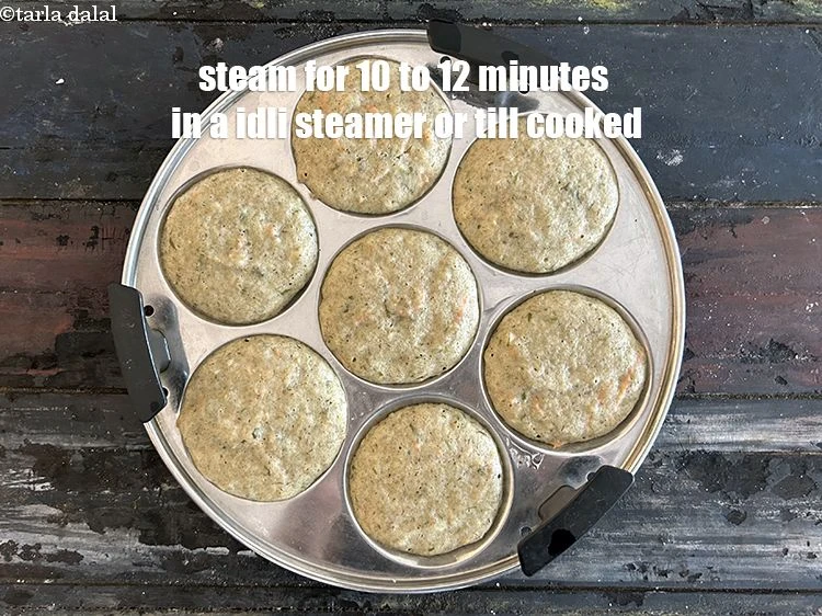 Step 31 – <p>Steam in a idli steamer for 10 to 12 minutes or until cooked.&nbsp;Repeat with the …