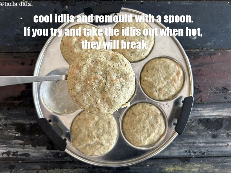 Step 32 – <p>Cool idlis and demould with a spoon. <i><u>If you try and take the idlis out …