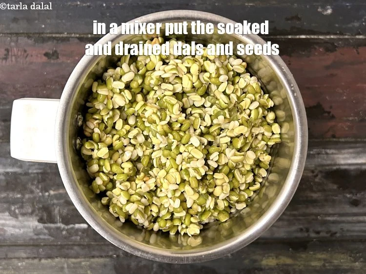 Step 11 – <p>In a mixer put soaked and drained&nbsp;green moong dal, urad dal and fenugreek seeds</p>