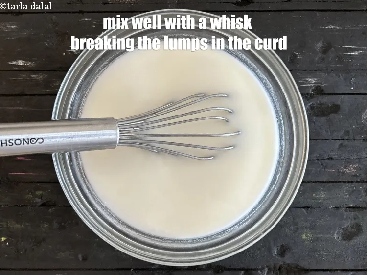 Step 6 – <p>Mix well with a whisk breaking the lumps in the curd.</p>
