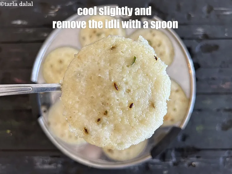 Step 35 – <p>Cool slightly and remove the&nbsp;<strong>quick rava&nbsp;idli</strong>&nbsp;from the mould using a spoon. If you are facing …