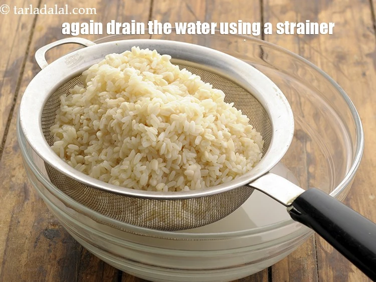 Step 8 – <html><head><meta charset="UTF-8"></head><body><p>Again <strong>drain</strong> the water using a strainer.&nbsp;&nbsp;<br>&nbsp;</p></body></html>