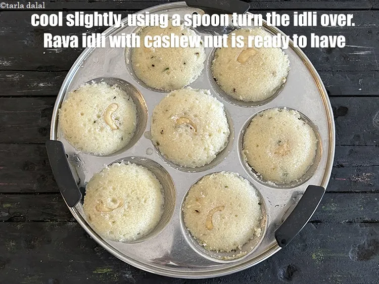 Step 40 – <p>Cool slightly, using a spoon turn the idli over. Rava idli with cashew nut is …