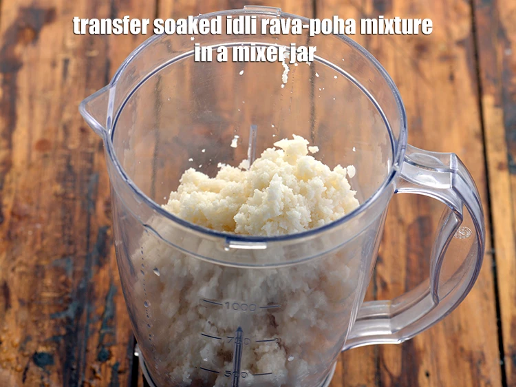 Step 12 – <p>Transfer the soaked idli rava-poha mixture in a mixer jar.</p>