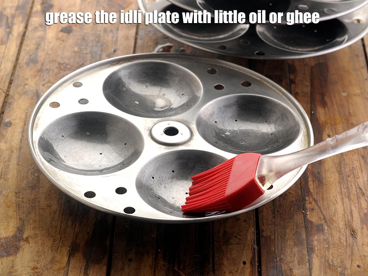 Step 25 – <p>grease the idli plate with little oil or ghee.</p>