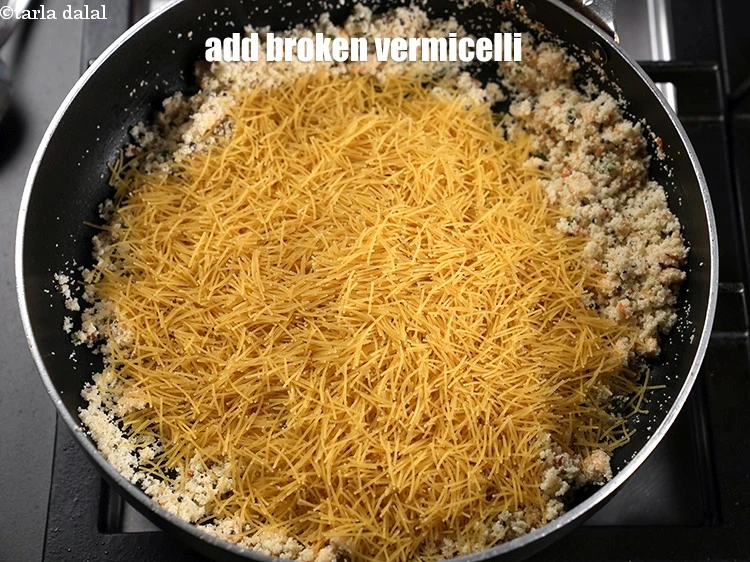 Step 18 – <p>Add 2 cups <a href="https://www.tarladalal.com/glossary-broken-vermicelli--2571i">broken vermicelli (sevaiyan)</a>.</p>
