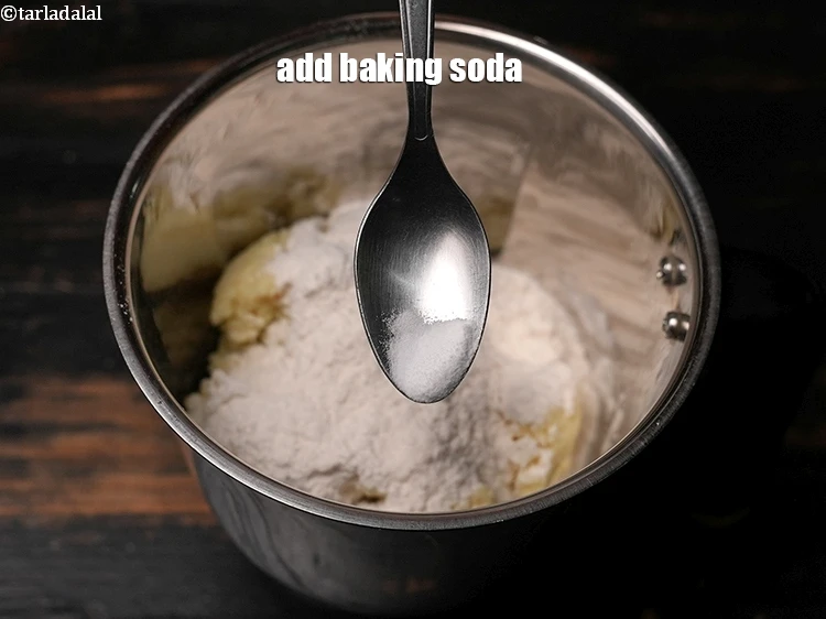 Step 11 – <p>Add a pinch of <a href="https://www.tarladalal.com/glossary-baking-soda-soda-bi-carb-615i"><u>baking soda</u></a><u>.</u></p>