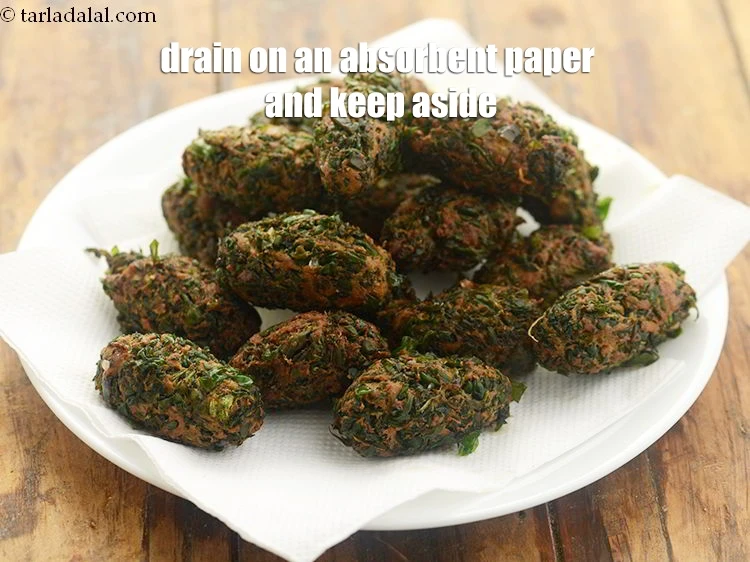 Step 22 – <p>Drain on an absorbent paper and keep aside. You can make this muthiya a day …