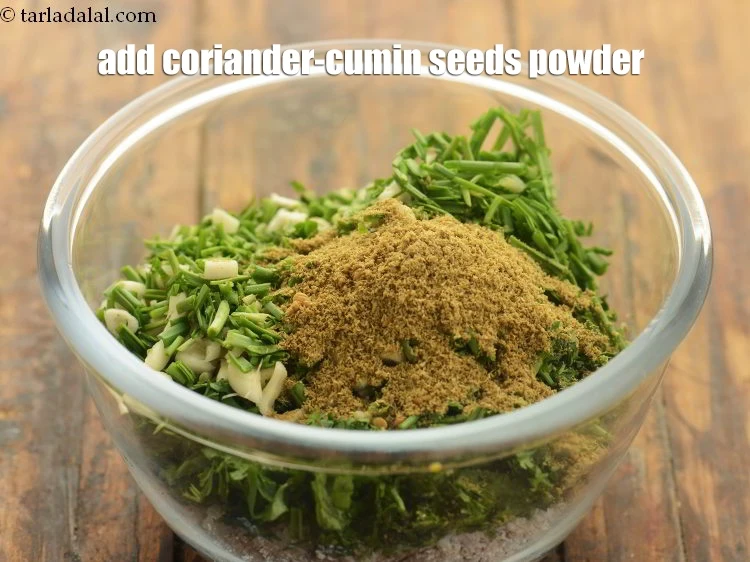 Step 26 – <p>Add 1 tbsp <a href="https://www.tarladalal.com/glossary-coriander-cumin-seeds-powder-dhania-jeera-powder-375i"><u>coriander-cumin seeds (dhania-jeera) powder</u></a><u>.</u></p>