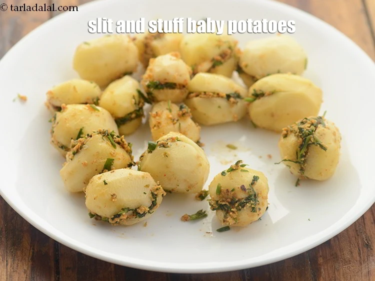 Step 34 – <p>Slit and stuff baby potatoes.&nbsp;</p>