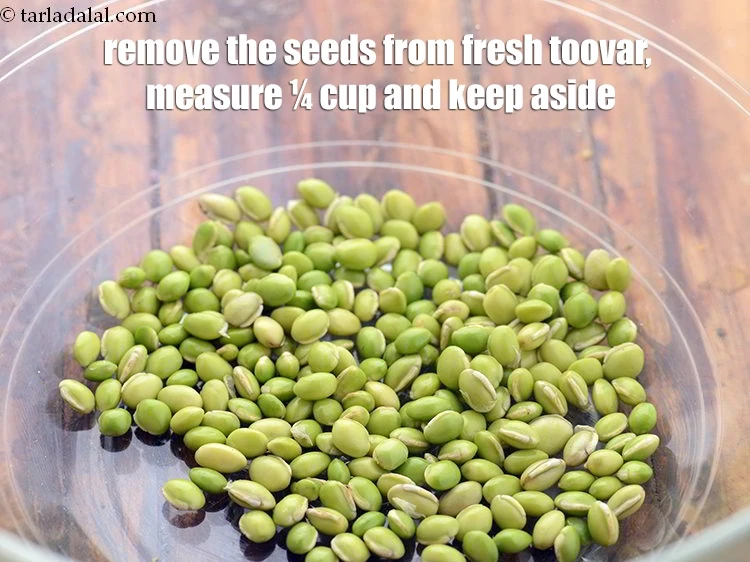 Step 39 – <p>Remove the seeds from <a href="https://www.tarladalal.com/glossary-fresh-toovar-fresh-toor-2612i"><u>fresh toovar</u></a>, measure ¼ cup and keep aside.</p>