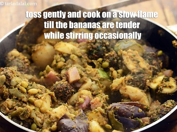 Step 58 – <p><strong>Toss gently </strong>and <strong>cook</strong> on a slow flame till the bananas are tender while stirring …