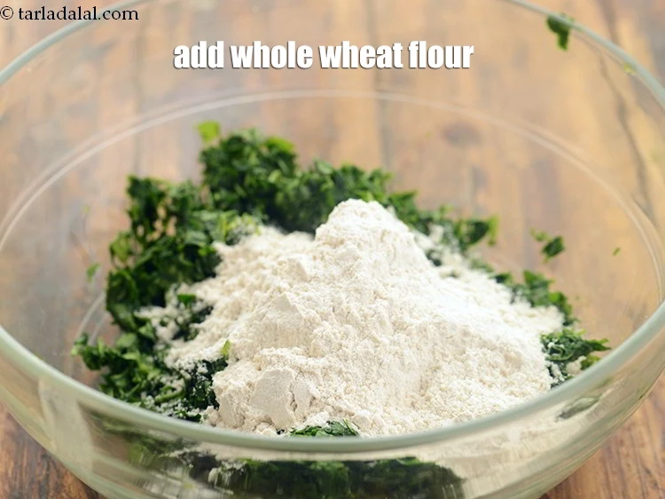 Step 8 – <p>Add 1/2 cup <a href="https://www.tarladalal.com/glossary-whole-wheat-flour-gehun-ka-atta-gehun-ka-aata-429i"><u>whole wheat flour (gehun ka atta)</u></a><u>.</u></p>