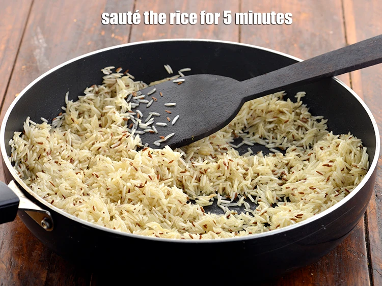 Step 14 – <p><span style="background-color:rgb(255,255,255);color:rgb(0,0,0);">Sauté the rice for 5 minutes. Do not stir it much or else the …