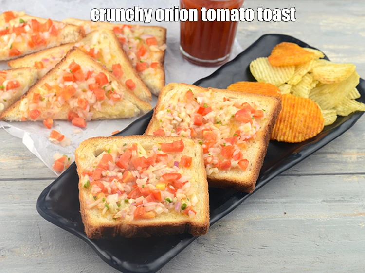 Step 20 – <p>Serve the <strong>onion tomato and cheese open toast</strong> immediately with <a href="https://www.tarladalal.com/glossary-tomato-ketchup-tomato-sauce-181i"><u>tomato ketchup</u></a>.</p>