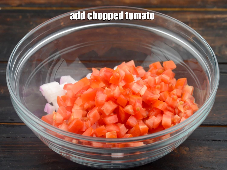 Step 4 – <p>Add 1/2 cup&nbsp;<a href="https://www.tarladalal.com/glossary-chopped-tomatoes-779i">chopped tomatoes</a>.&nbsp;</p>
