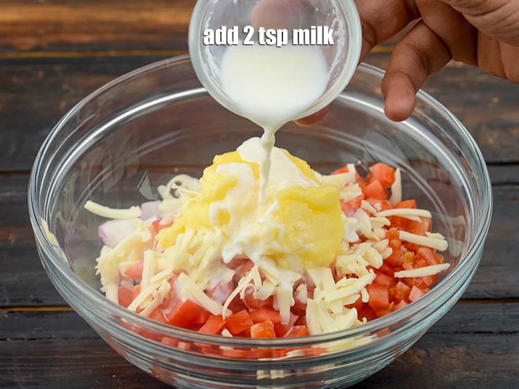 Step 7 – <p>Add 2 tsp&nbsp;<a href="https://www.tarladalal.com/glossary-milk-doodh-full-cream-milk-514i">milk</a>.&nbsp;</p>