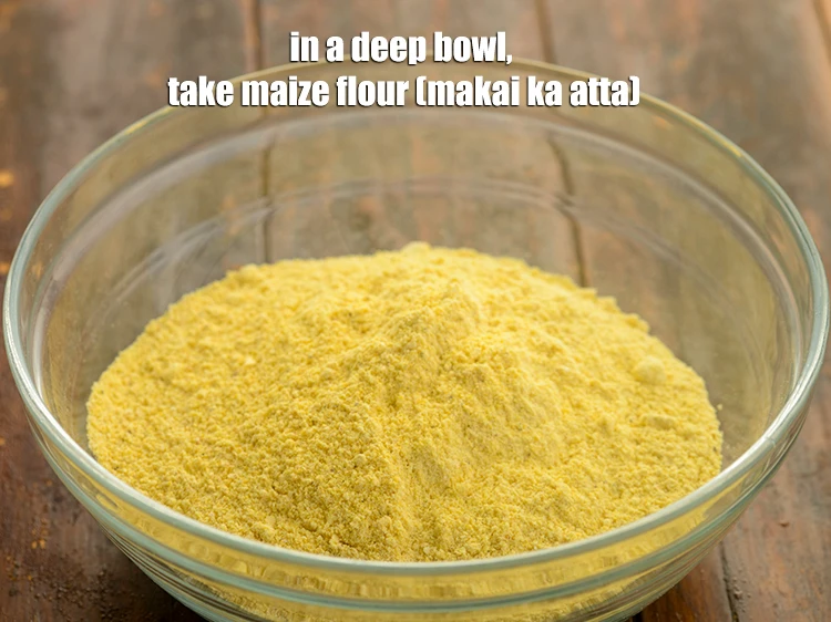 Step 2 – <p><span style="background-color:rgb(255,255,255);color:rgb(0,0,0);">To make </span><strong>makki ki roti</strong><span style="background-color:rgb(255,255,255);color:rgb(0,0,0);">,</span>&nbsp;in a deep bowl, take 2 cups <a href="https://www.tarladalal.com/glossary-maize-flour-makai-ka-atta-makki-ka-atta-162i"><u>maize …