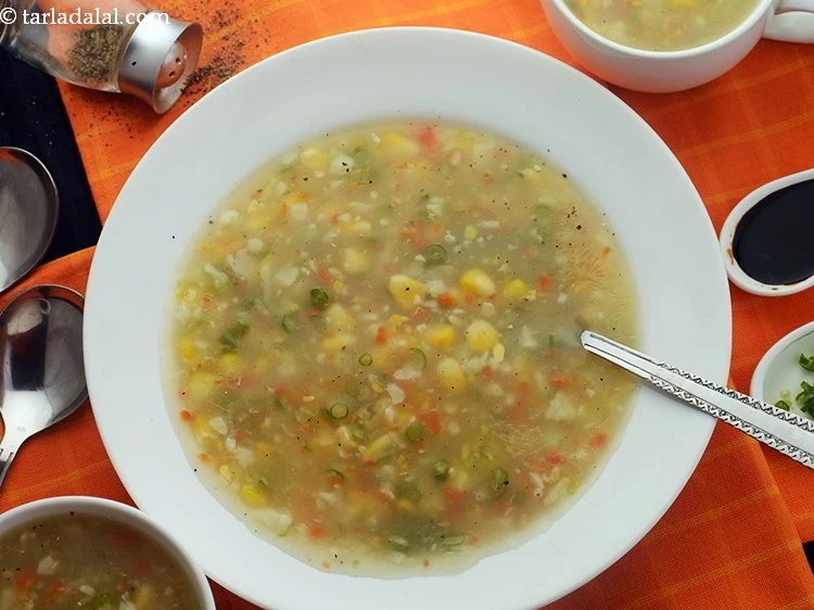 Step 17 – <p>Serve the <strong>sweet corn and vegetable soup</strong> immediately with chillies in vinegar.</p>