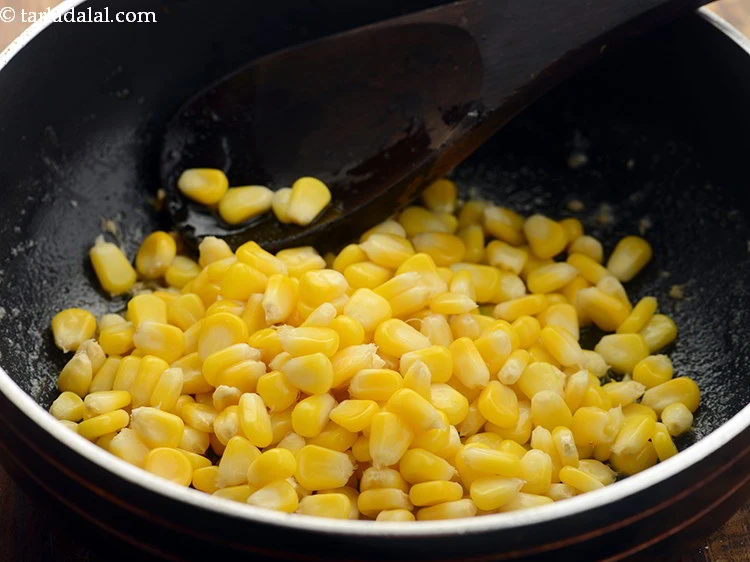 Step 9 – <p>Add the 1 1/4 cups <a href="https://www.tarladalal.com/glossary-sweet-corn-kernels-makai-ke-dane-156i#ing_2309"><u>boiled sweet corn kernels (makai ke dane)</u></a>. Immediately add …