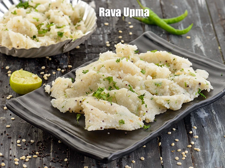 Step 21 – <p>Serve the <strong>upma</strong> immediately garnished with coriander.</p>