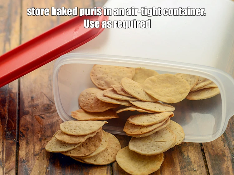 Step 17 – <p>Store the <strong>baked puris</strong> in an air-tight container. Use as required.</p>