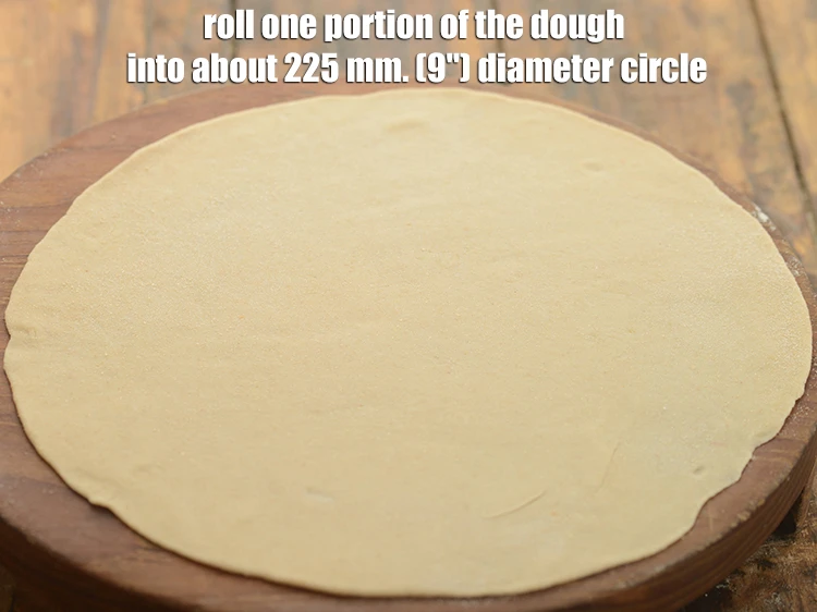 Step 9 – <p><span style="background-color:rgb(255,255,255);color:rgb(0,0,0);">Roll one portion of the dough into about 225 mm. (9") diameter circle, using …