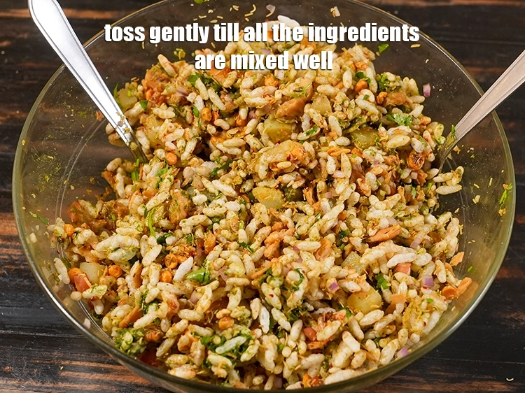 Step 17 – <p>Toss gently till all the ingredients are mixed well. Divide the bhel into 4 equal …