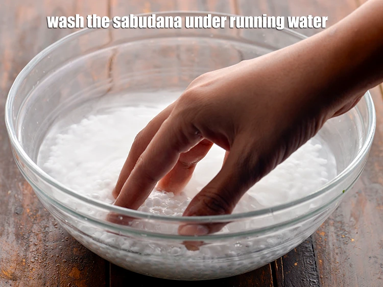 Step 8 – <p>Wash the <strong>sabudana</strong> under running water or in a bowl full of water twice or …