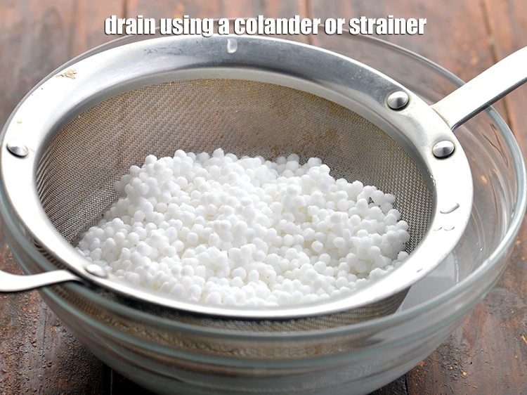Step 9 – <p>Drain the sabudana using a colander or strainer.</p>