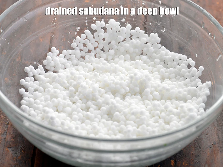 Step 10 – <p>Transfer the washed and drained sabudana in a deep bowl.</p>