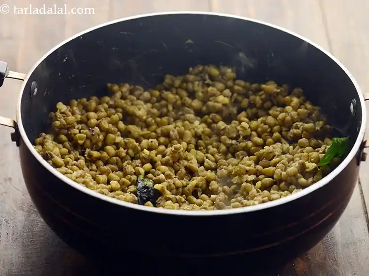 Step 22 – <p>Mix well and cook on a medium flame for 1 minute.</p>