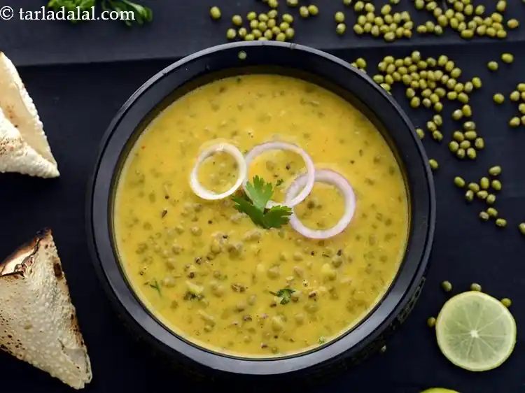 Step 27 – <p>Serve <strong>Gujarati khatta moong </strong>immediately with bhakri, rice or roti.</p>