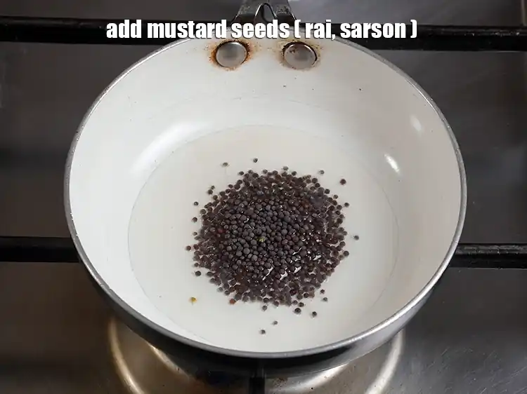 Step 42 – <p>Add 1 tsp <a href="https://www.tarladalal.com/glossary-mustard-seeds-sarson-rai-sarson-ke-beej-525i"><u>mustard seeds ( rai / sarson)</u></a><u>.</u></p>