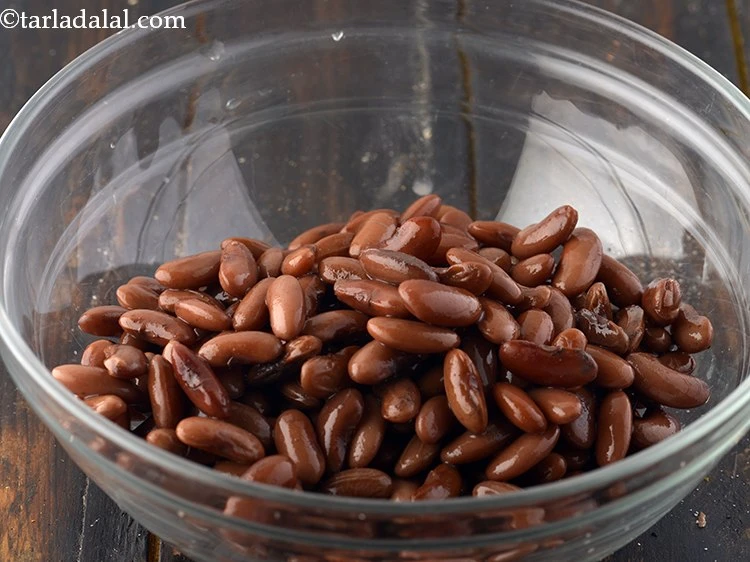 Step 9 – <p>Transfer the boiled rajma on deep bowl.</p>