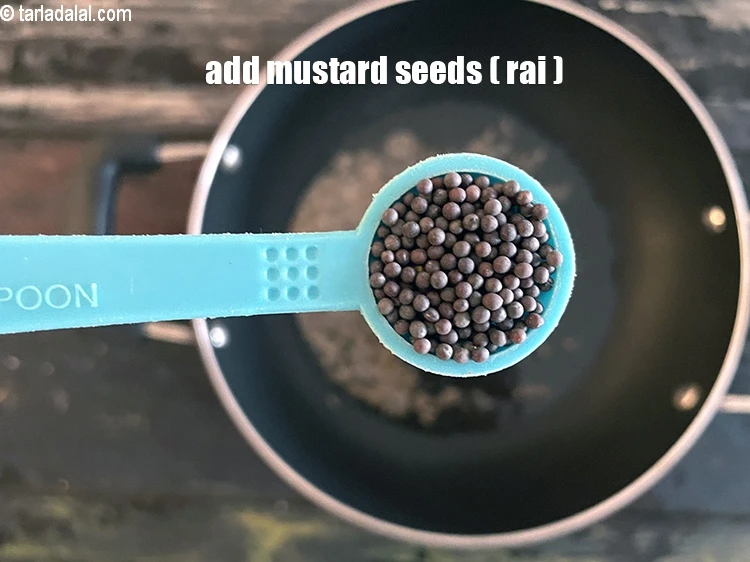 Step 14 – <html><head></head><body><p>Add&nbsp;1/2 tsp&nbsp;<a href="glossary-mustard-seeds-sarson-rai-sarson-ke-beej-525i">mustard seeds ( rai / sarson)</a>.</p></body></html>