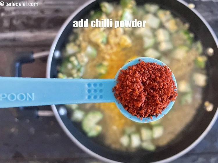 Step 23 – <html><head></head><body><p>Add&nbsp;1/2 tsp&nbsp;<a href="glossary-chilli-powder-red-chilli-powder-339i">chilli powder</a>.</p></body></html>