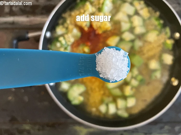 Step 24 – <html><head></head><body><p>Add&nbsp;1/4 tsp&nbsp;<a href="glossary-sugar-chini-shakkar-278i">sugar</a>.</p></body></html>