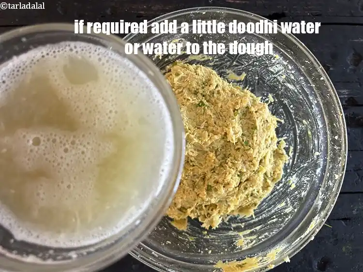 Step 18 – <p>If required add a little of the doodhi water or water to the dough.</p>