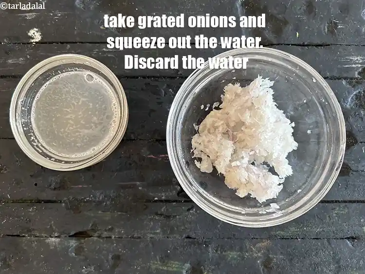 Step 2 – <html><head></head><body><p>Take&nbsp;1/4 cup&nbsp;<a href="glossary-grated-onions-999i">grated onions</a>&nbsp;and squeeze out the water. Discard the water.</p></body></html>